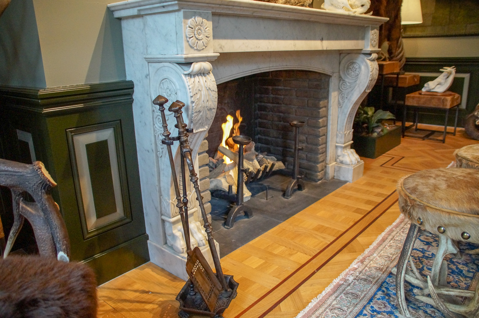 Burning fireplace with fireplace accessories