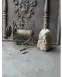Antique Weight-Driven Spit Jack made of Wrought iron, Brass, Wood, Stone, Rope 