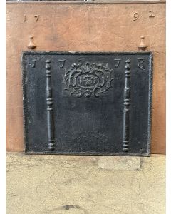 Pillars with IHS Monogram Fireback