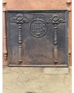 Pillars with IHS Monogram Fireback