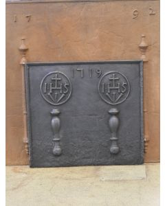 Pillars with IHS Monogram Fireback