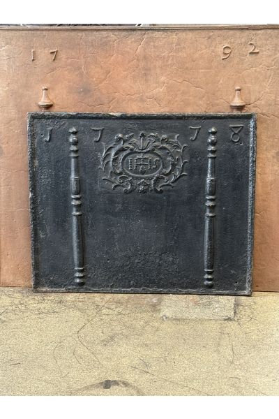 Pillars with IHS Monogram Fireback