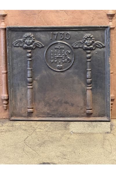 Pillars with IHS Monogram Fireback