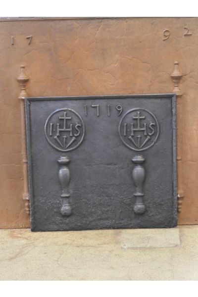 Pillars with IHS Monogram Fireback