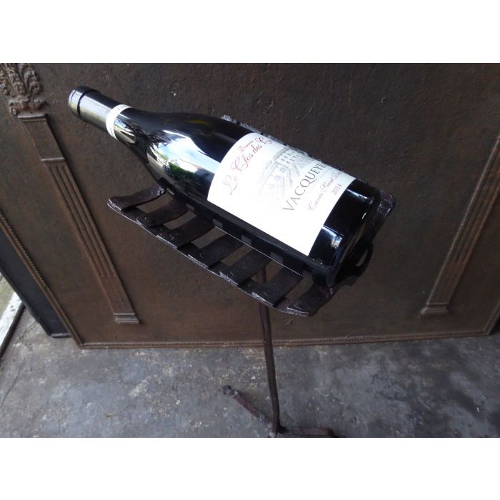 Fireplace support for bottle of red wine made of Wrought iron 