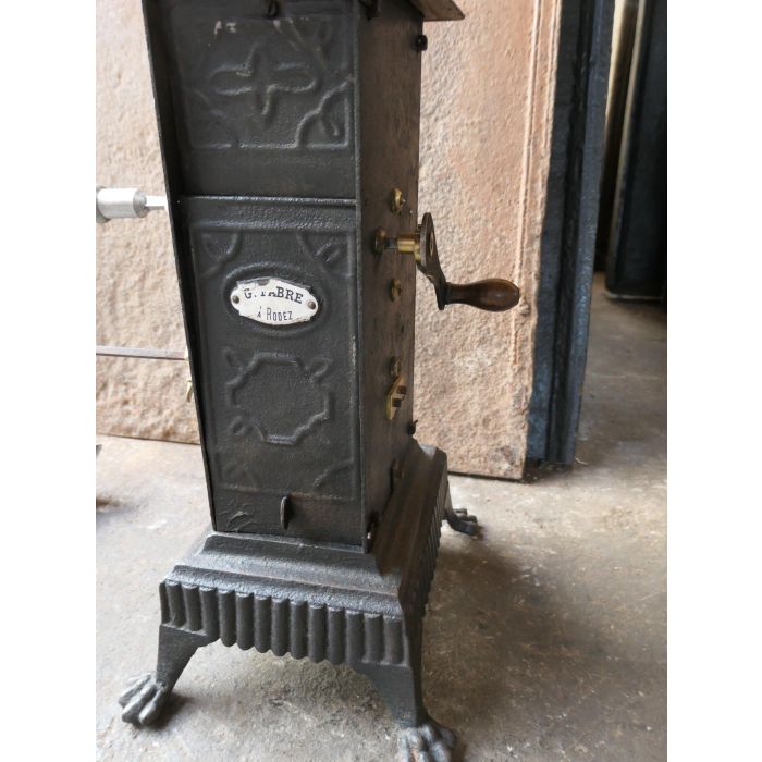 Antique Spring-Driven Roasting Jack made of Cast iron, Wrought iron, Brass 