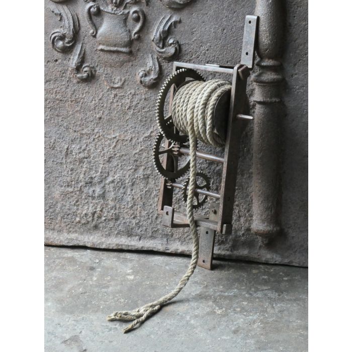 Antique Wall-Mounted Spit Jack made of Wrought iron, Brass, Wood, Rope 