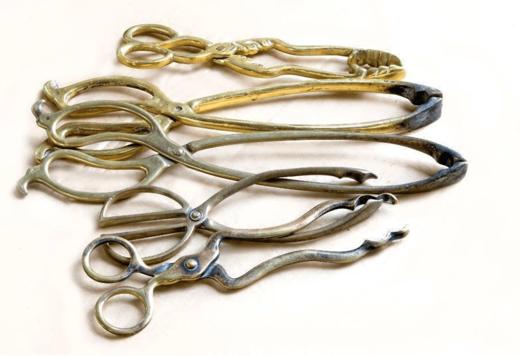 See our selection of antique coal scissors or coal tongs here.