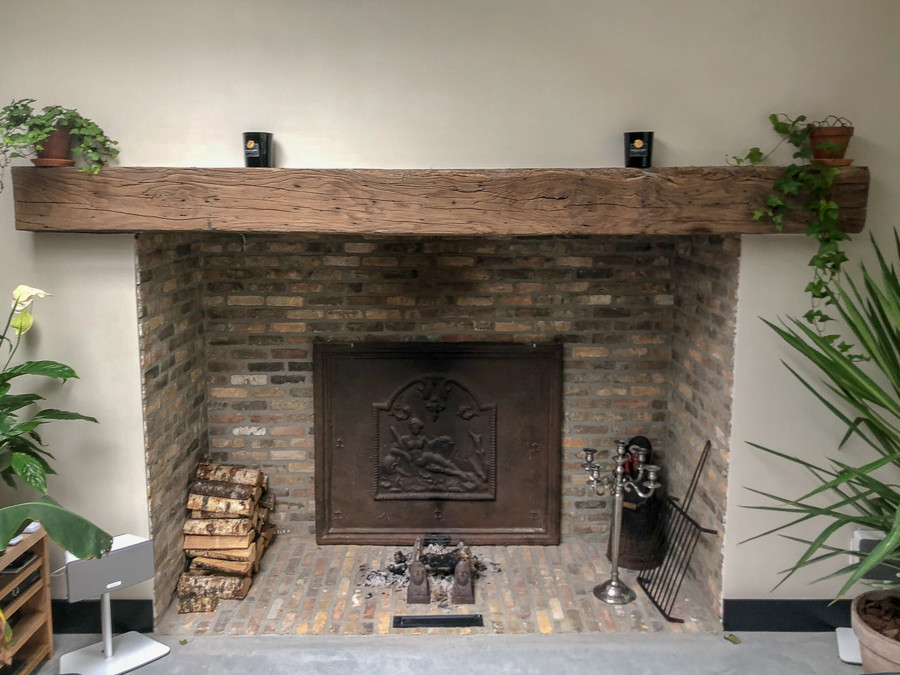 Fireback in fireplace in Den Bosch sourced by https://www.firebacks.net