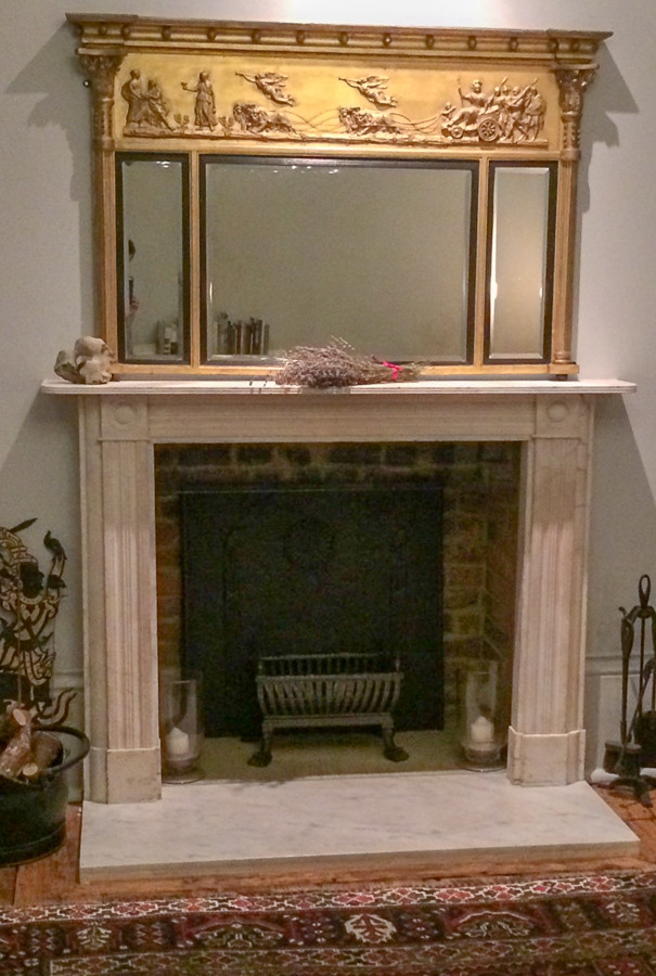 Fireplace fireback and fire grate in London from https://www.firebacks.net