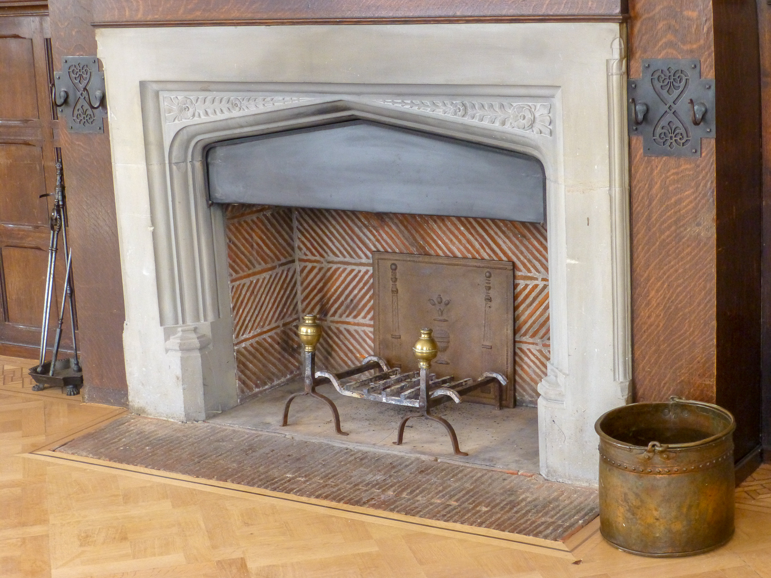 Unused fireplace with fireplace accessories