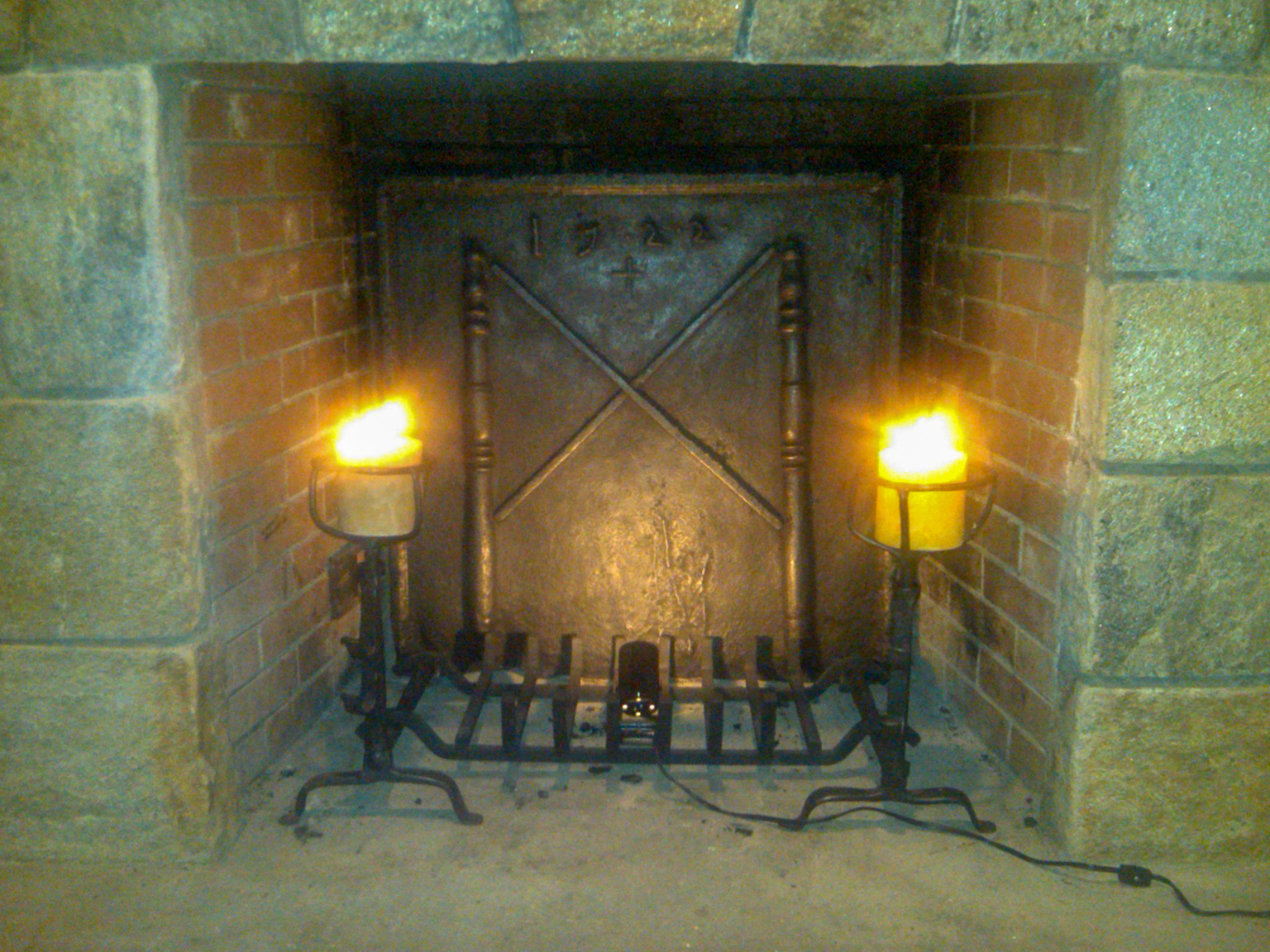 Unused fireplace with decorations