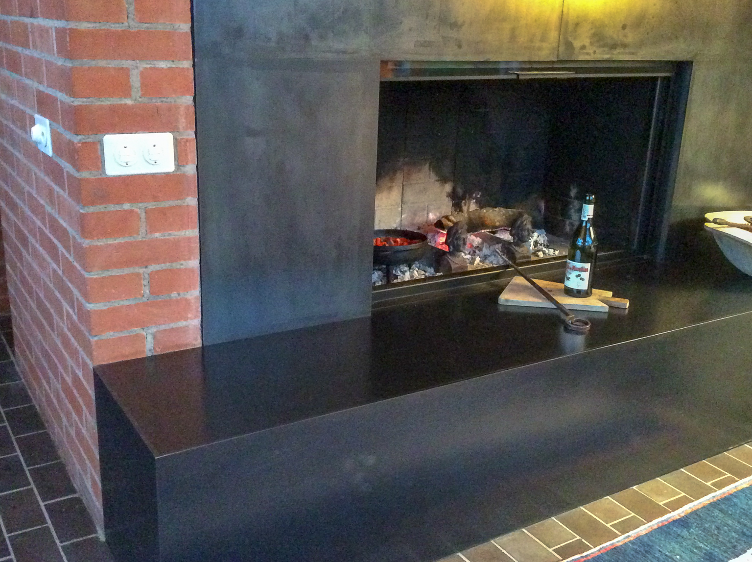 Fireplace accessories in Zürich, Switzerland, sourced by https://www.firebacks.net