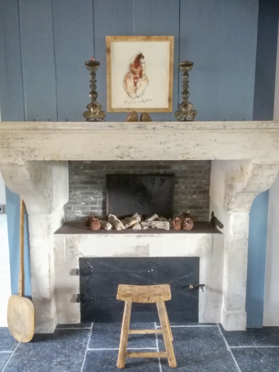 Unused fireplace decorated as a wood-burning fireplace