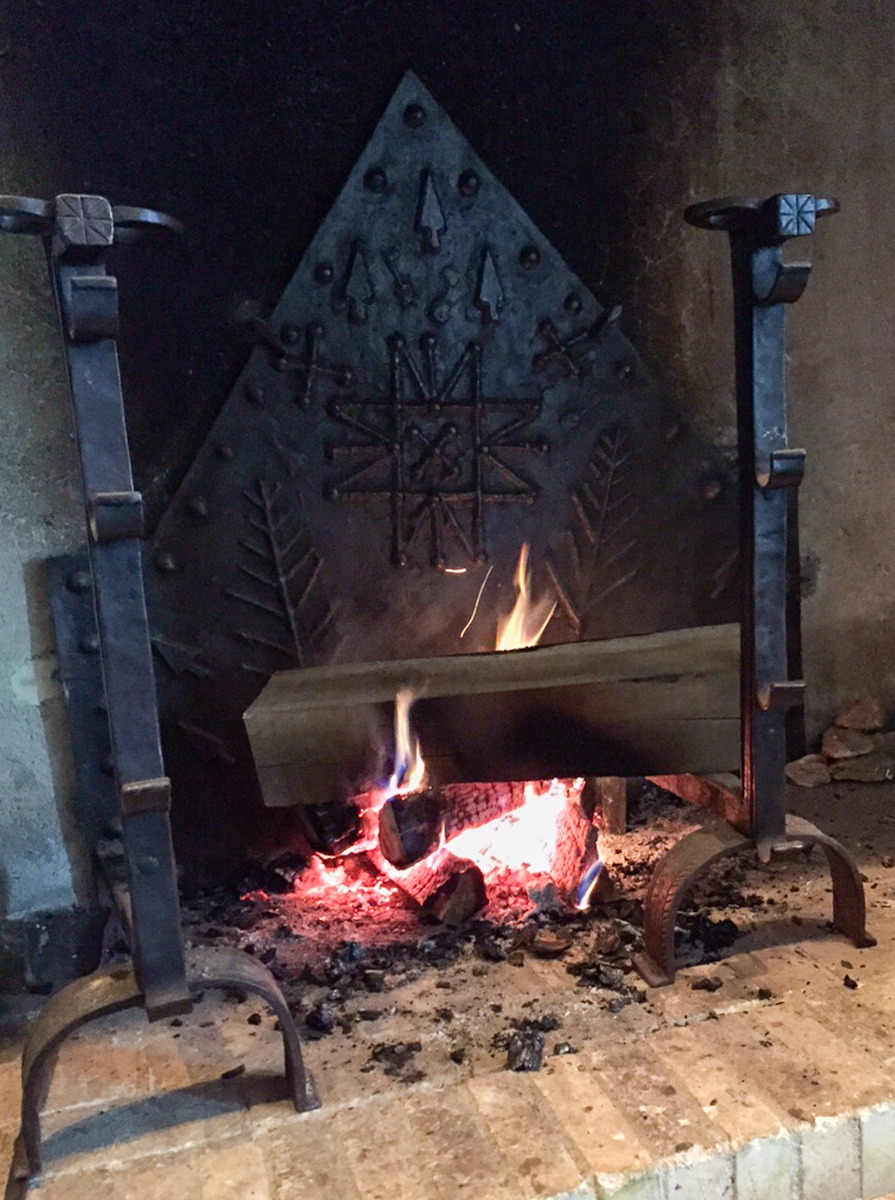 Fireplace fireback and andirons in Corrèze, France from https://www.firebacks.net