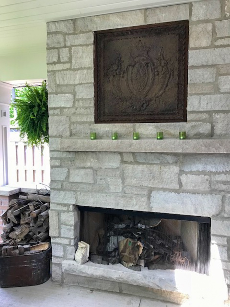 Fireback in outdoor fireplace in Ontario, Canada sourced from https://www.firebacks.net