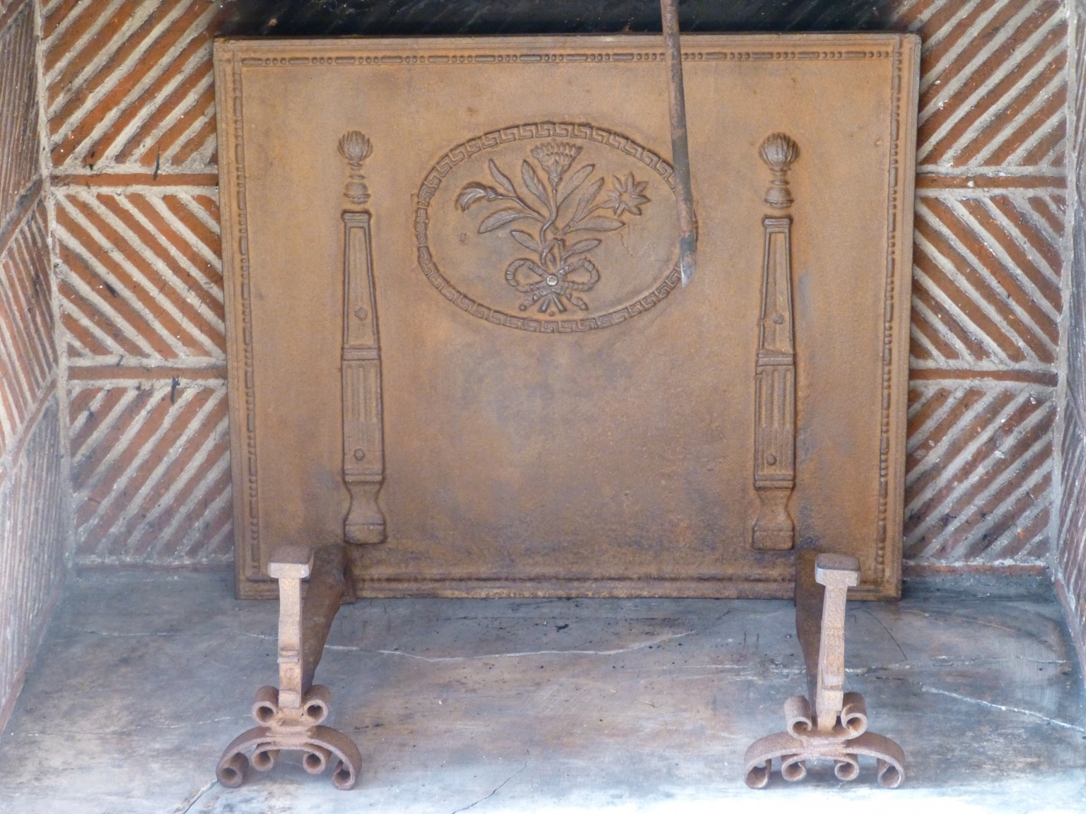 Antique firebacks and andirons by https://www.firebacks.net