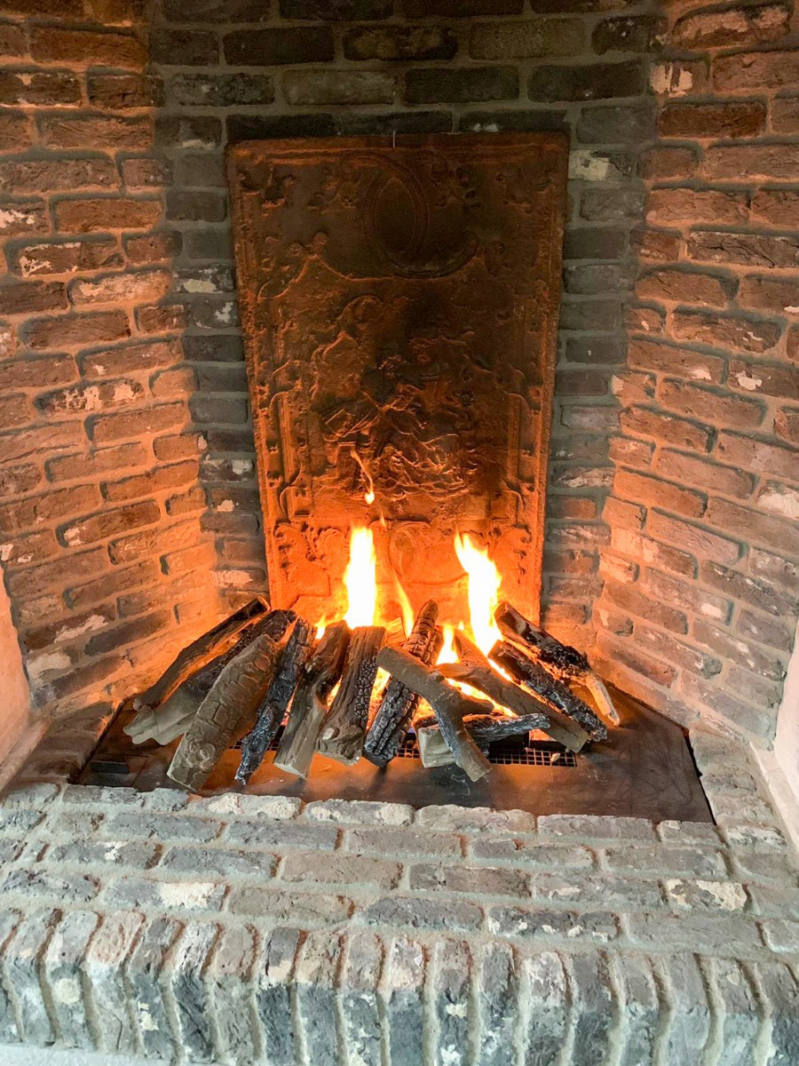 Fireplace fireback and andirons in Amstelveen, Netherlands from https://www.firebacks.net